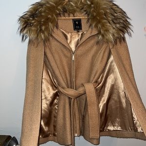 Guess poncho/jacket with real fur collar. Satin finish on the inside